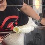 she is making a vase with angel wings