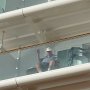 Norman on our balcony waiving to me as I leave for my tour