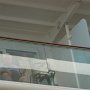 Norman waving from our balcony, he is glad to see me.