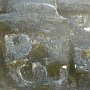 on the temple there were masks engraved into the rocks