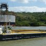 and the barge that is 2/3 full you can see how it is weigh down, when this one is full then the empty one will be put in its place