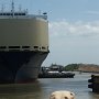as we come out we see a tanker from Korea that is carrying cars, we have to pass on the right side.  This ship missed his appointment so he will go through the Pedor Miguel Locks but will stay in the lake overnight before going through the Gatun Locks the next day