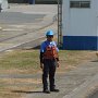 here is a worker waiting to tie us up 